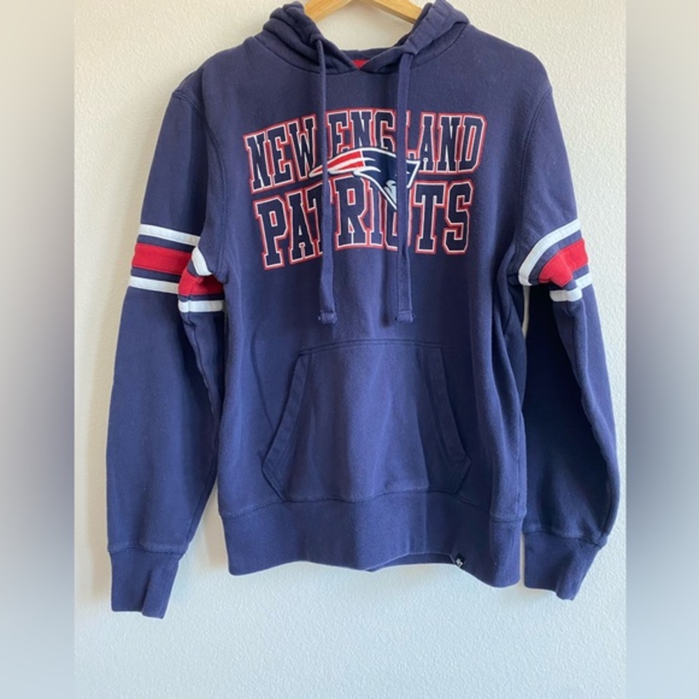 47 New England Patriots women’s hooded sweatshirt size small.